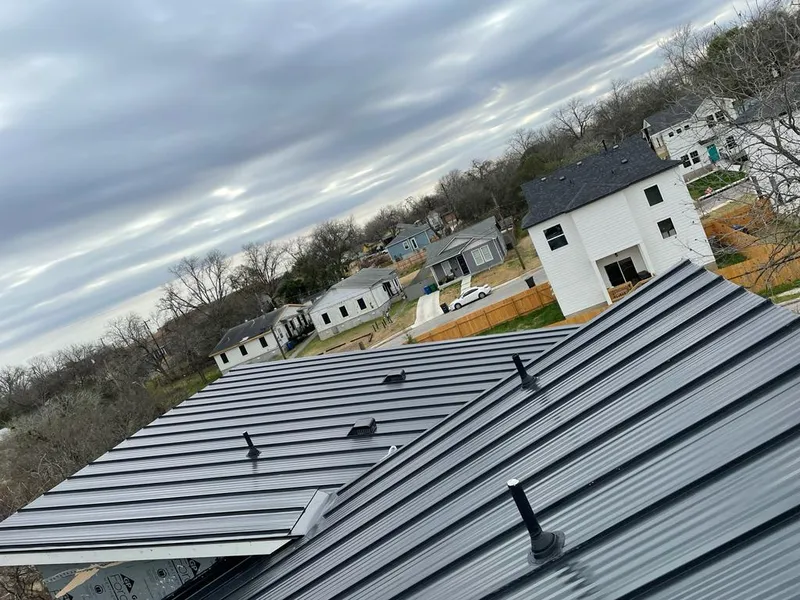 Standing seam metal roof panels with vents for Skylight Repair in Bigfork